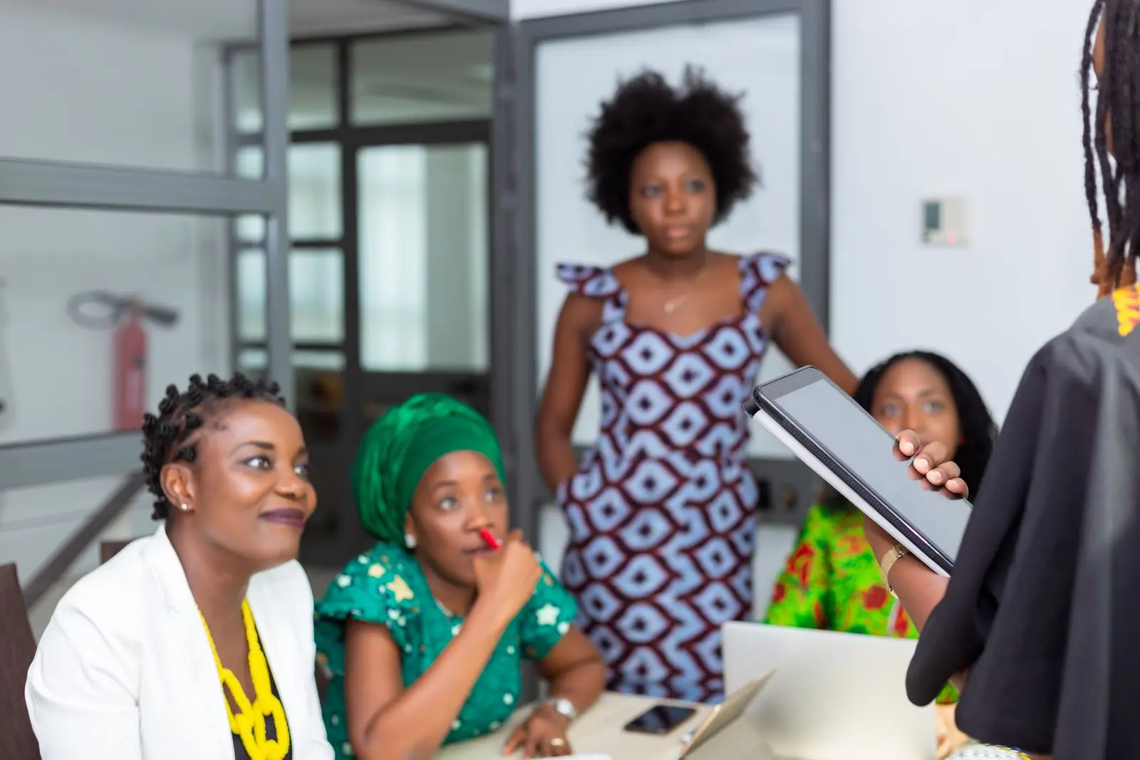 African women collaborating during a professional business workshop